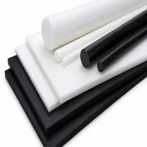 Resina acetal (POM) en placas y barras industriales de color blanco y negro, material de ingeniería de alta precisión utilizado para fabricar engranajes, bujes, guías, piezas mecanizadas y componentes con excelente resistencia al desgaste, baja fricción y alta estabilidad dimensional